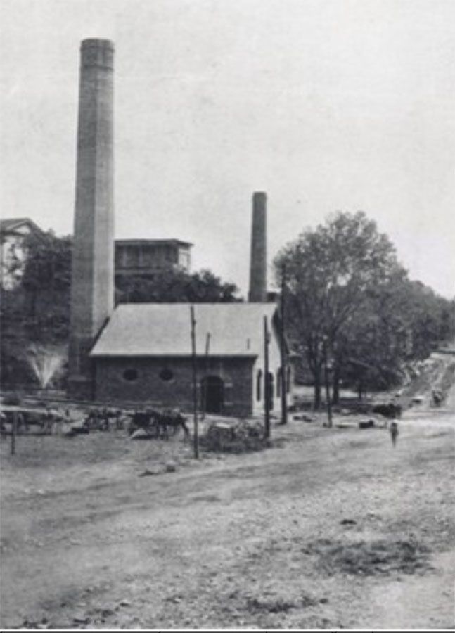 Waterworks-and-Smokestacks A view of Big Spring Park before it was the gathering space of Huntsville. A view of the smokestacks and pump house from the current site of Huntsville Utilities, looking up toward West Side Square.
